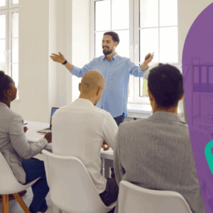 Man presents to colleagues in front of whiteboard, open arms for expression. Purple symbol and AFP logo on the right. Source Canva